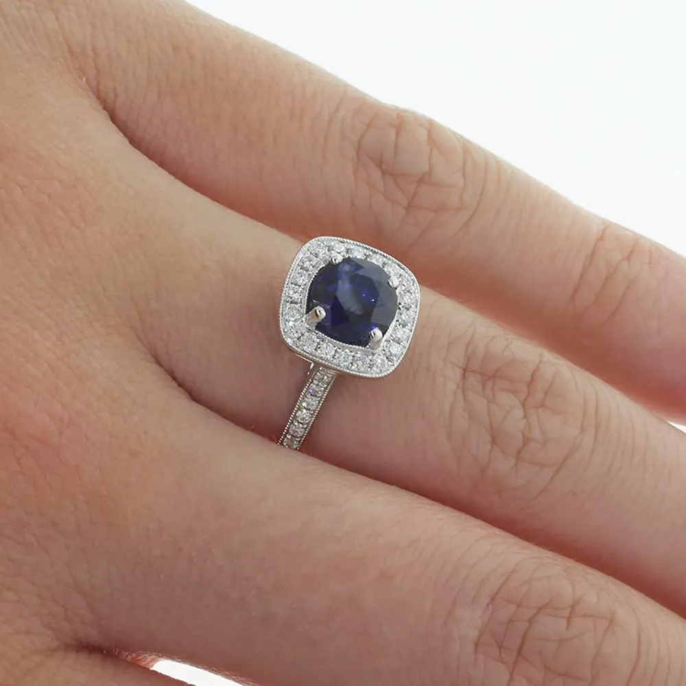 18ct Yellow & White Gold Sapphire & Diamond Halo Ring