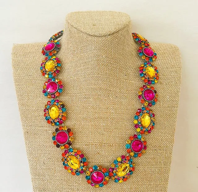 Fantastic multi colored faux stone statement necklace.beautiful details a mix of colors.