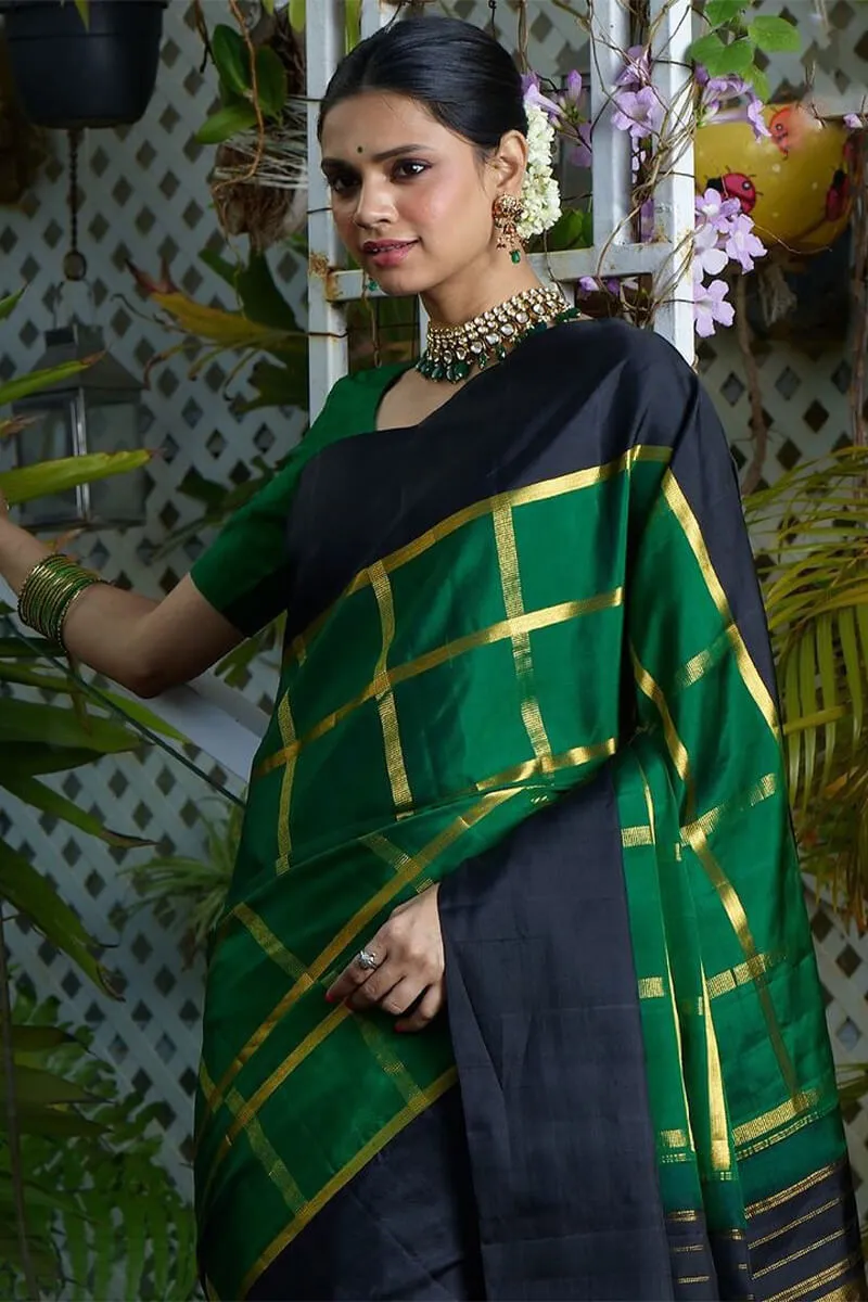 Sumptuous Dark Green Soft Silk Saree With Prominent Blouse Piece