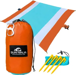 SUN NINJA Sand Free Beach Blanket - Outdoor Blanket, Beach Mat & Accessories - 10Ft X 9Ft Lightweight Blanket with Storage, Bottle Opener, Carabiner, Shoulder Strap, Corner Sand Pockets & 4 Stakes